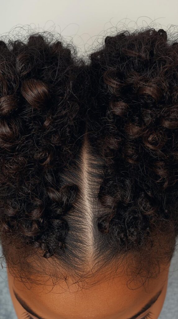 11. Space Buns with Defined Curls